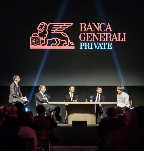 Evento Banca Generali Private con relatori e pubblico in sala.